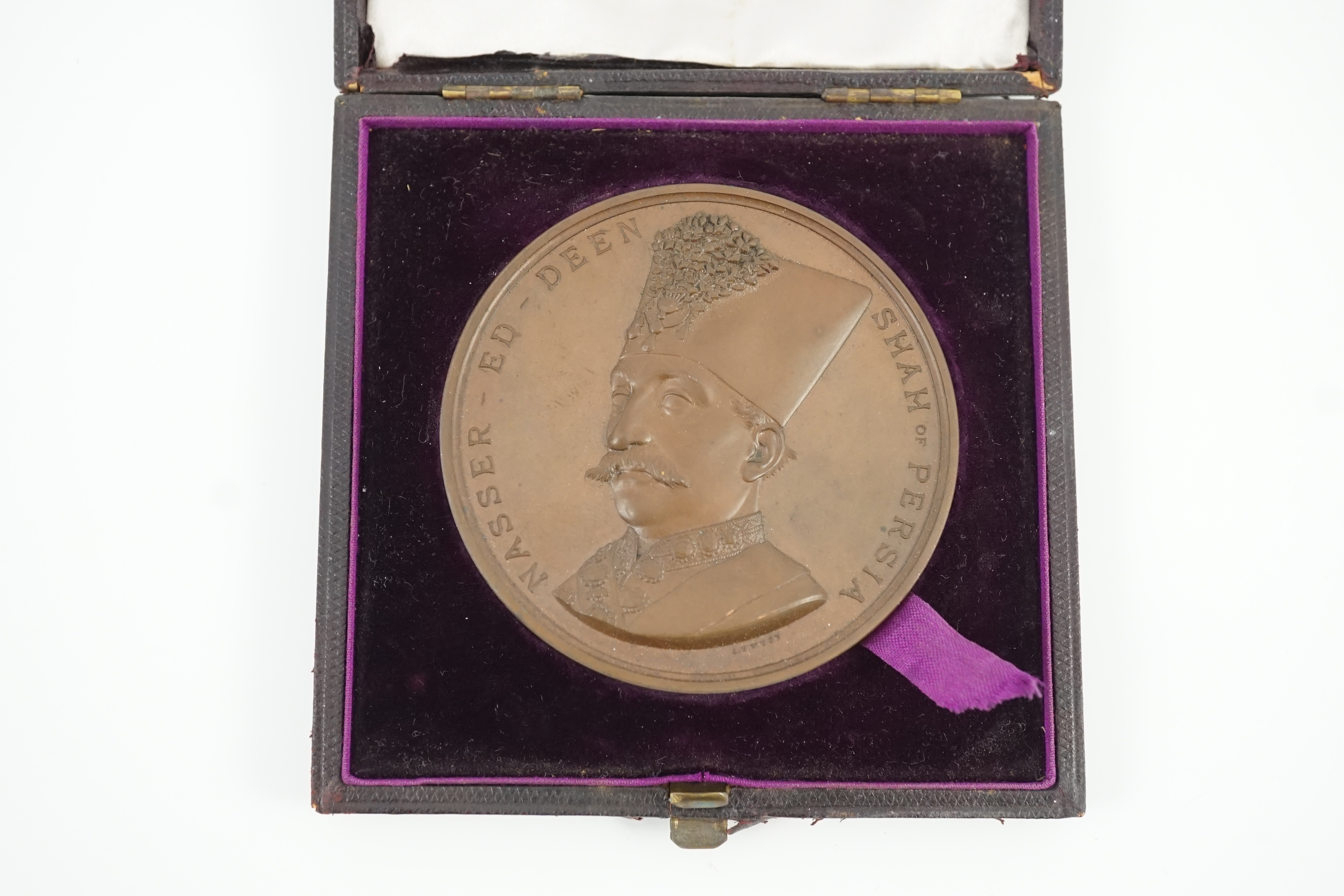 British commemorative medals – Victorian bronze medal marking the Visit of Nasser Ed Deen ‘Shah of Persia’ to London 1873, by A.B. Wyon, leather case